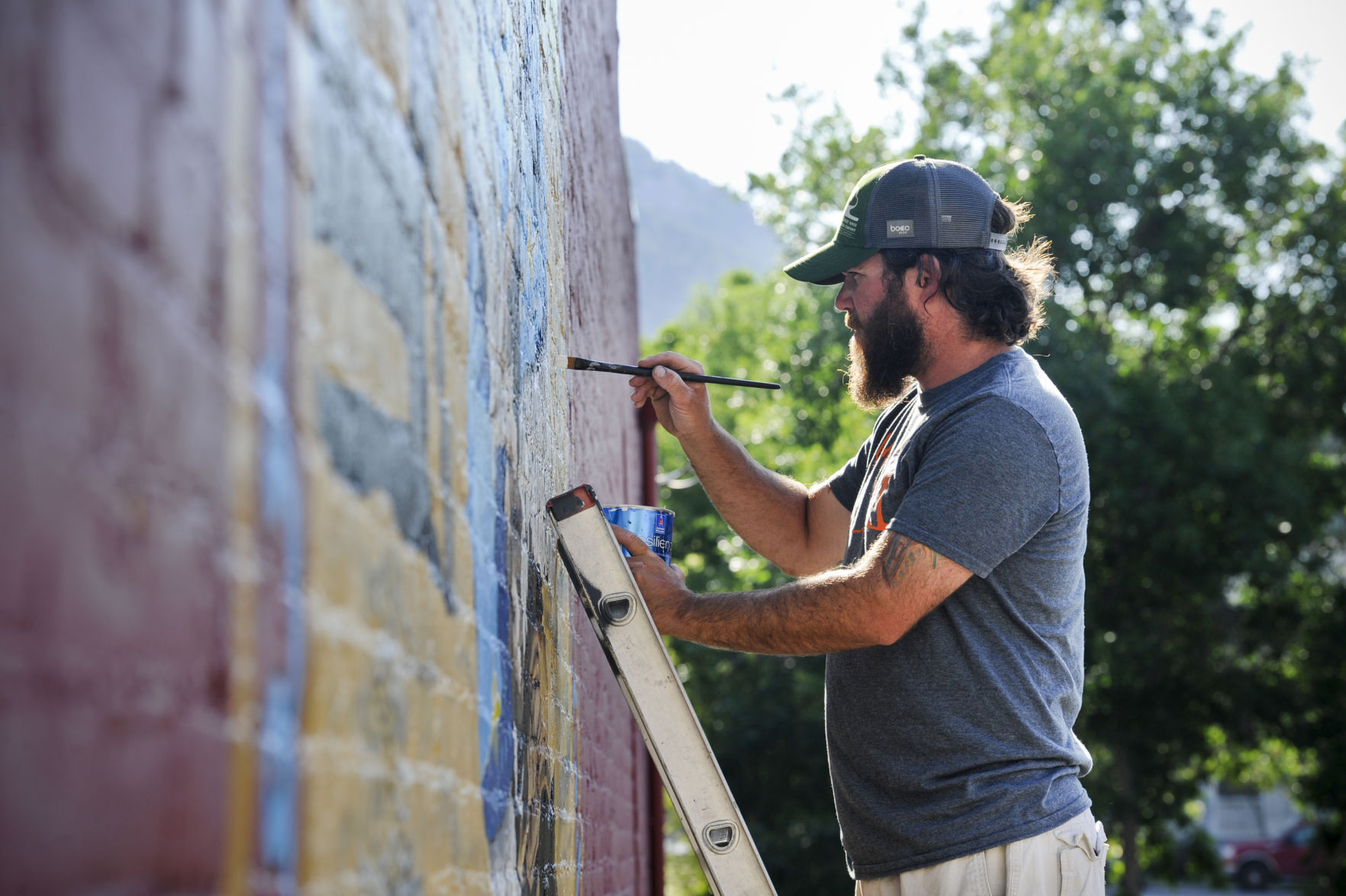 Helena artist Adam Riggs put the finishing touches